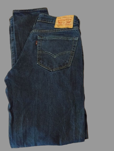 Jean Levi’s 510™  taille W33 L34, coloris bleu brut profond. Seconde main TBE