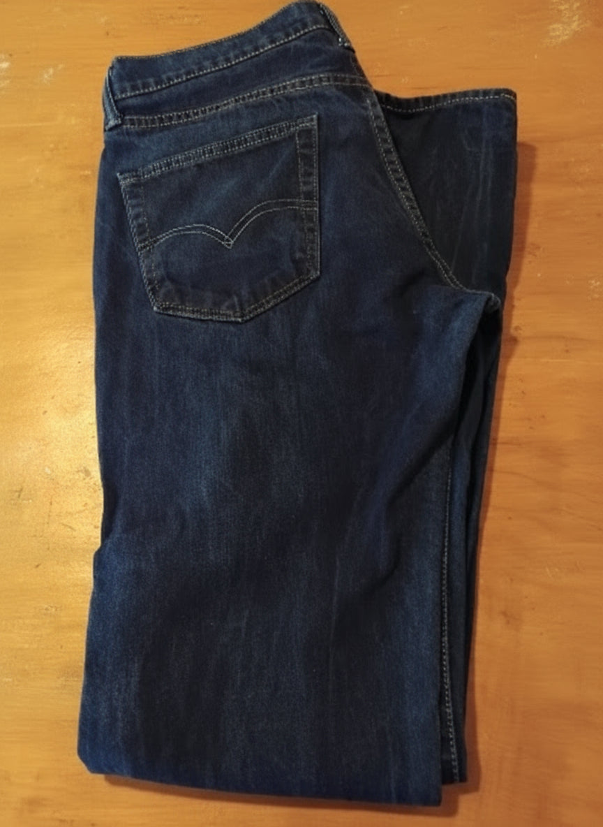 Jean Levi’s 510™  taille W33 L34, coloris bleu brut profond. Seconde main TBE