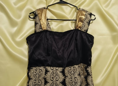 Robe noir dorée élégante, seconde main TBE