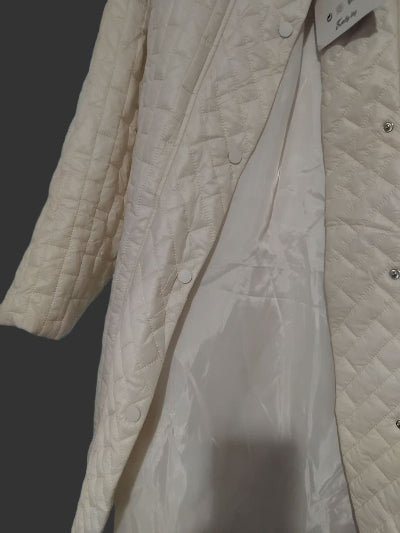 Veste longue matelassée beige – look chic et cocooning tendance. TU- Neuf