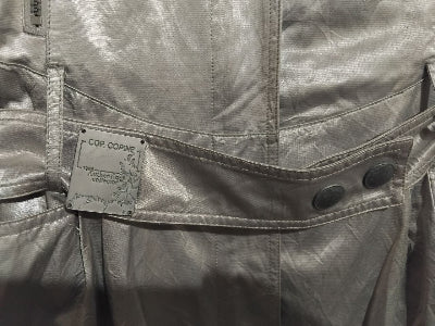 Veste mi longue argentée Cop.Copine femme – Style chic et futuriste, capuche et ceinture ajustable, seconde main TBE
