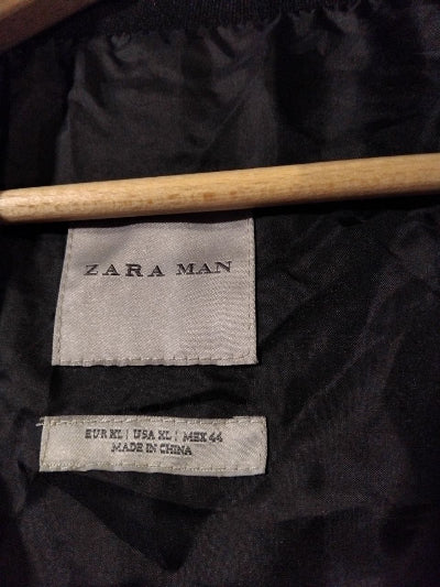 Veste longue Zara Man noire – Coupe droite à col côtelé, look urbain  moderne, seconde main TBE